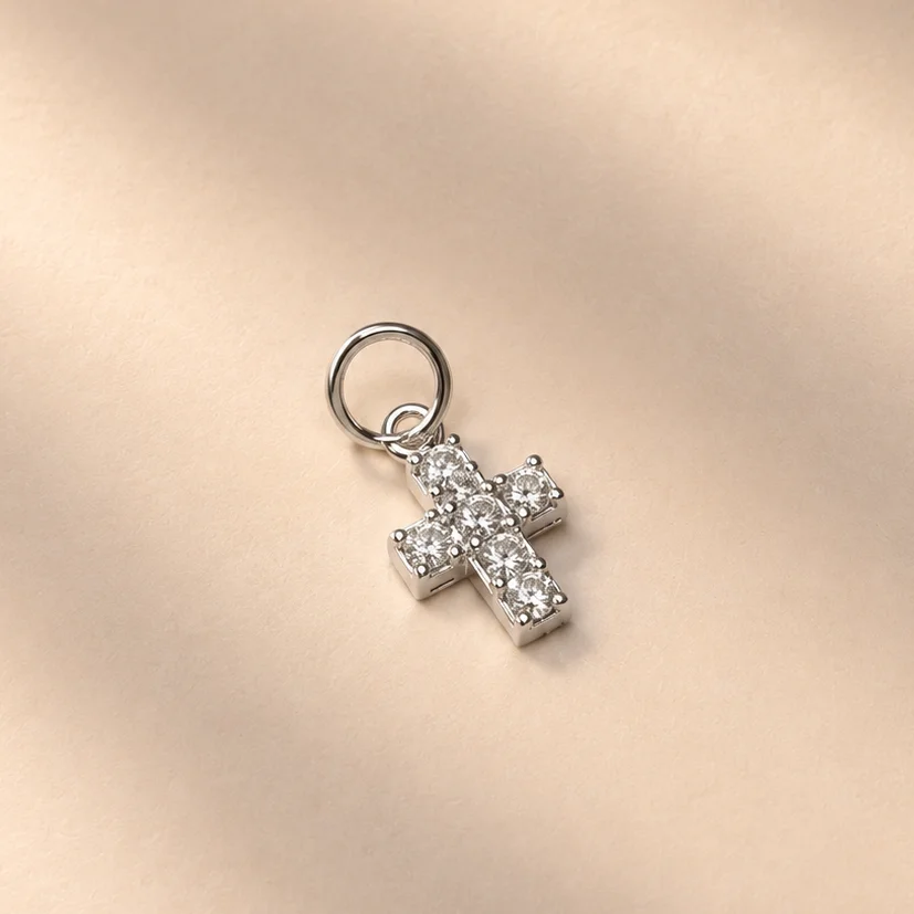 Dij. cruz plata 0,7cm DPS421