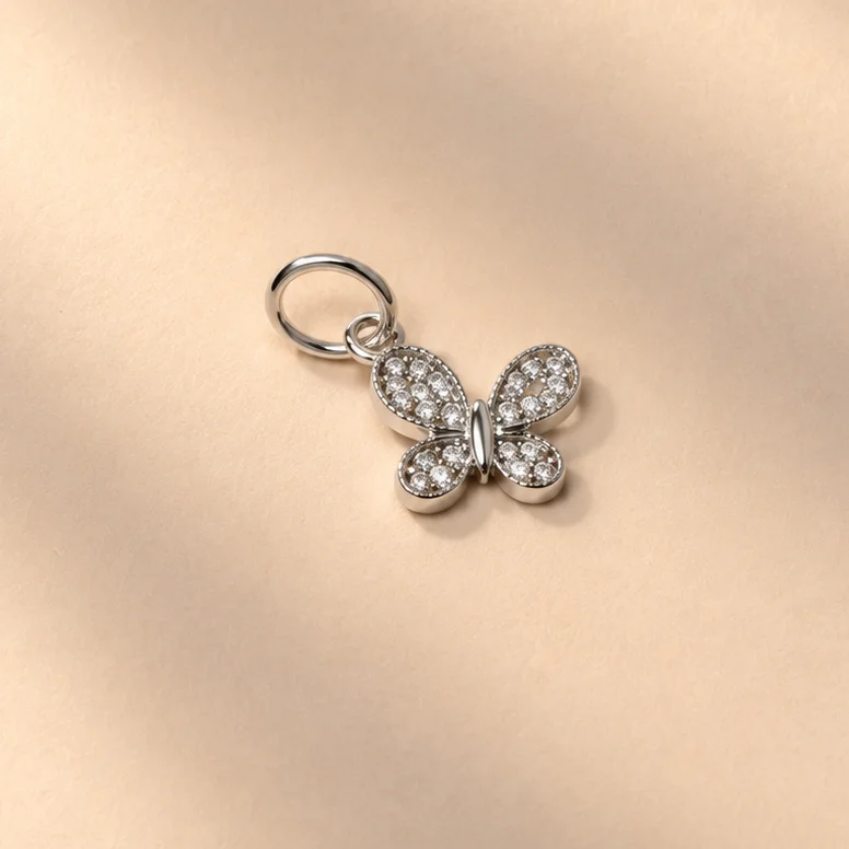 Dij. mariposa plata 0,7cm - DPS585