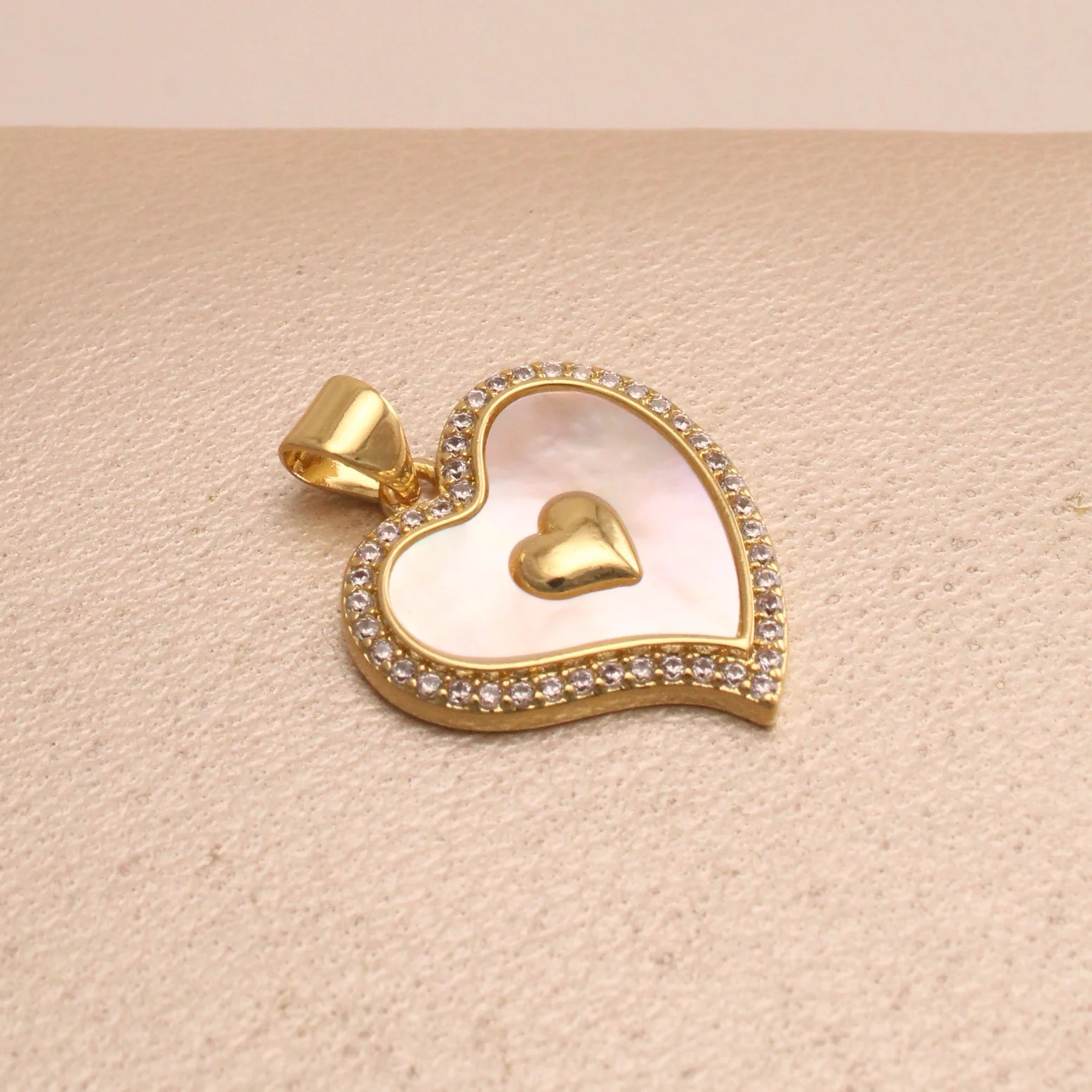 Dij. corazon nacar rodio 2cm - DRG905