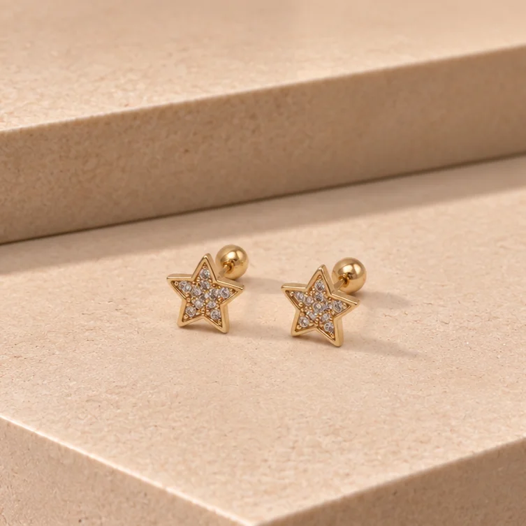 Top. estrella rodio 0.7cm - TRG254