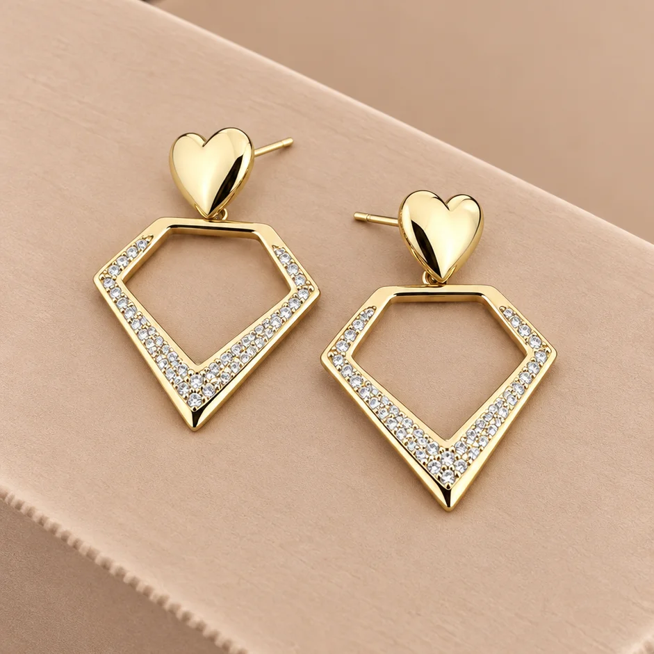 Top. cm triangulo corazon rodio 3cm - TRG437